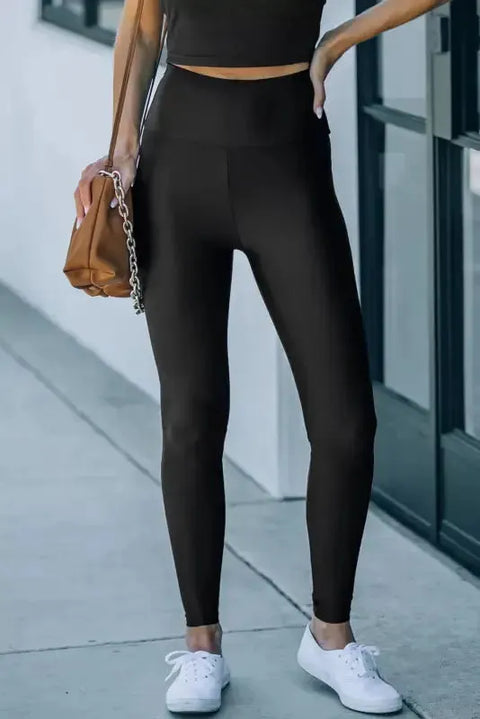 Woman wearing black high rise waist cincher leggings showing sculpting fit Fashionfitz UK