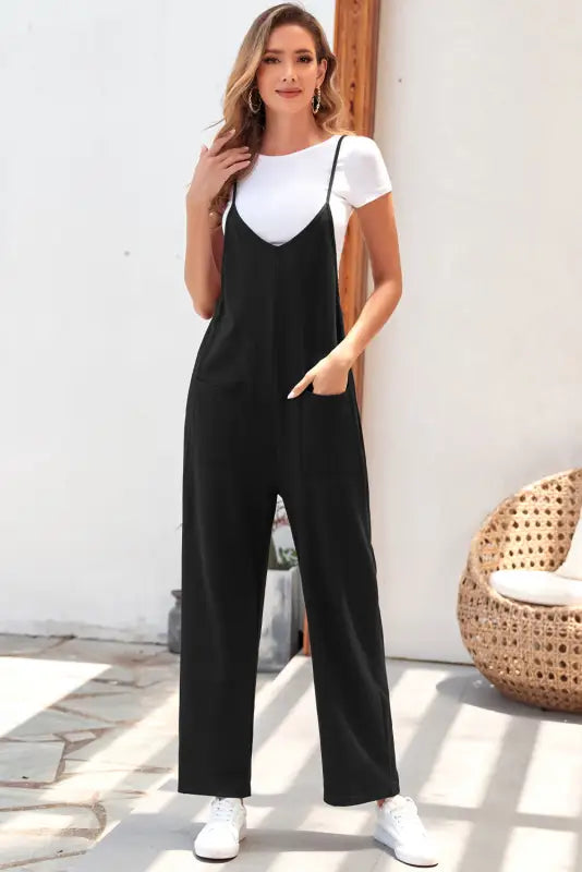 Black pocketed adjustable spaghetti strap straight leg jumpsuit - s / 95% polyester + 5% elastane - jumpsuits & rompers