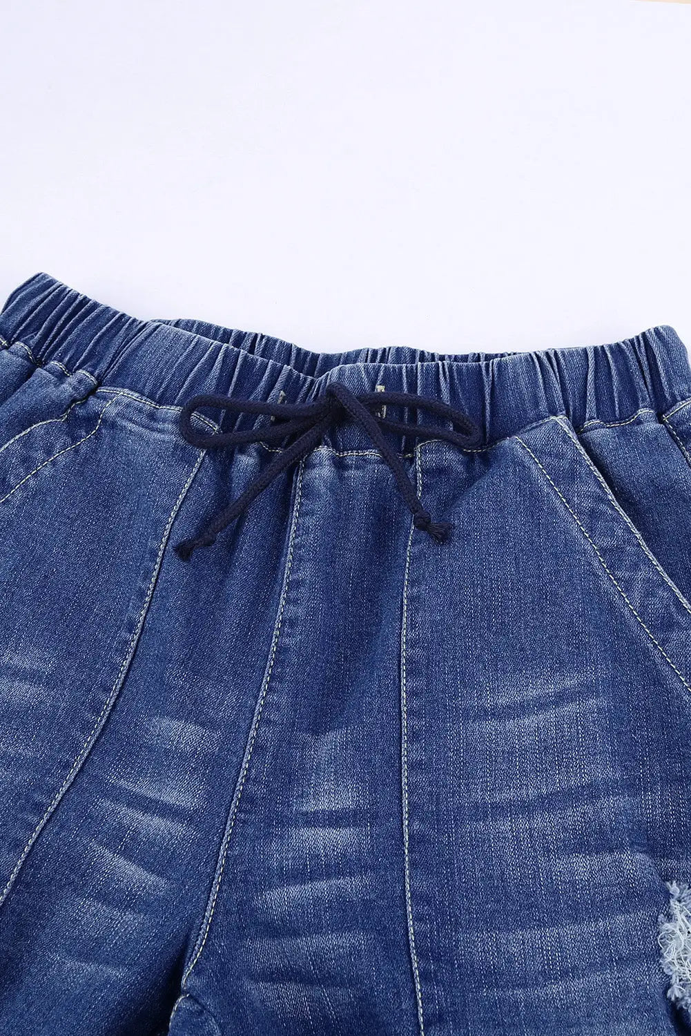 Black pocketed distressed denim jean - bottoms