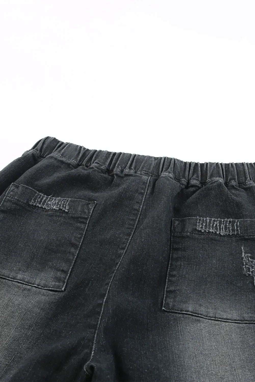 Black pocketed distressed denim jean - bottoms