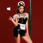 Complete naughty maid outfit with hat, belt, stick, and panty on white background