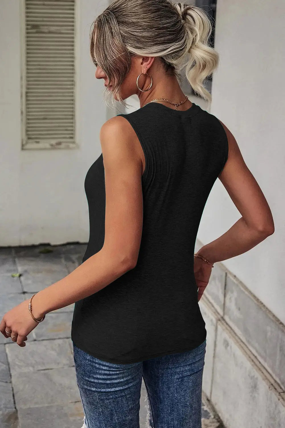 Black rib knit cut-out front twist tank top - tops