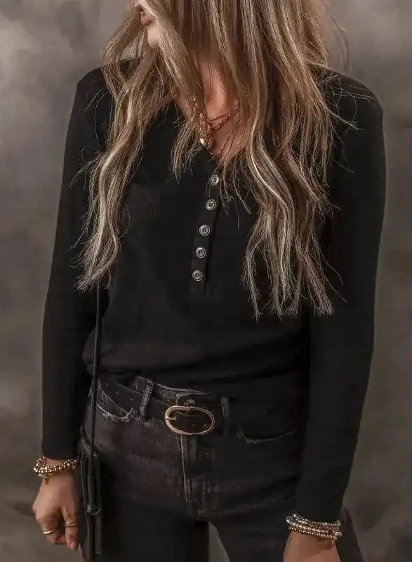 Black Ribbed V‑Neck Long Sleeve Top paired with a belt and accessories, a wardrobe essential for fall and casual layering.