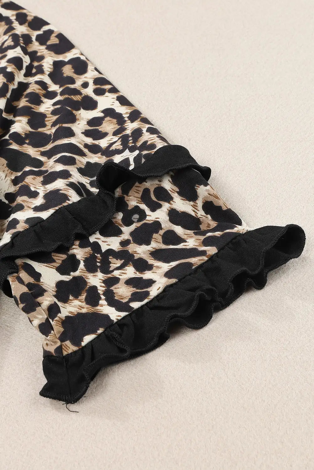 Black ruffled leopard sleeve patchwork top - tops