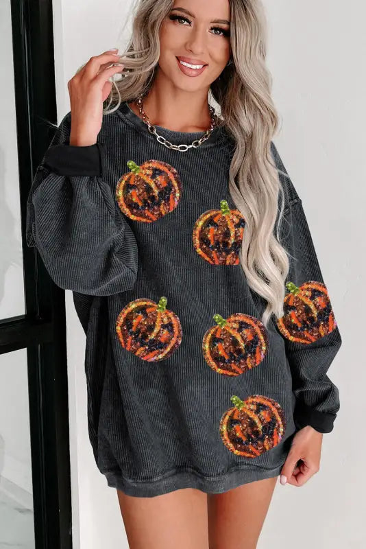 Black sequined jack o lantern corded baggy sweatshirt - graphic sweatshirts