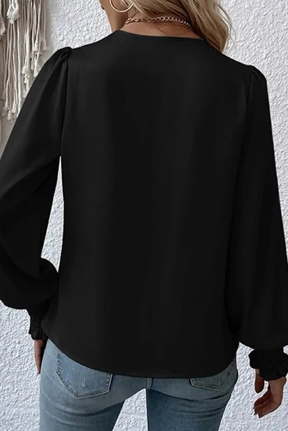 Black solid surplice neck shirred cuffs draped blouse - tops
