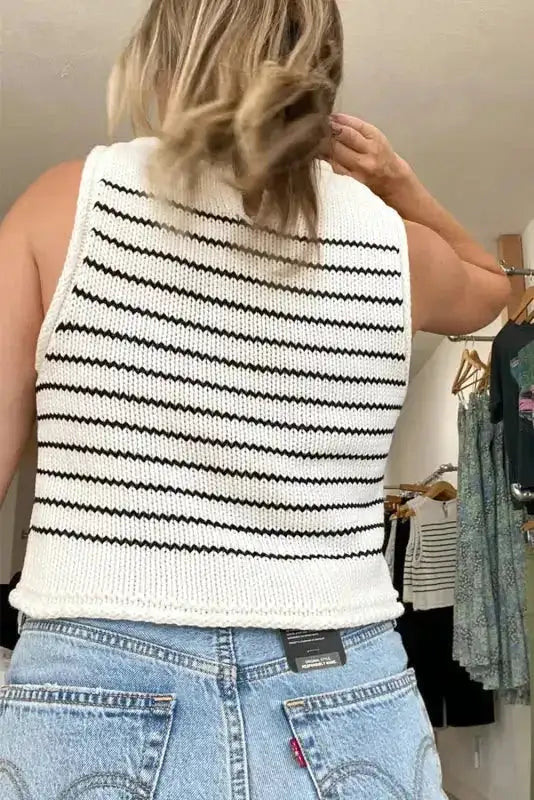 Back view of Black Stripe Raw Edge Knitted Vest, showcasing raw edge hem and consistent black stripe pattern on white knit fabric.