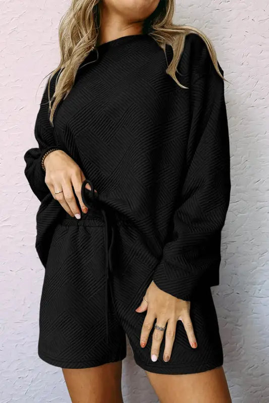 Black textured long sleeve top and drawstring shorts set