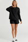 Black textured long sleeve top and drawstring shorts set