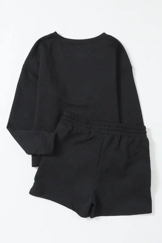 Black textured long sleeve top and drawstring shorts set