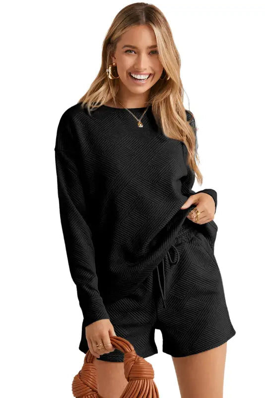 Black textured long sleeve top and drawstring shorts set