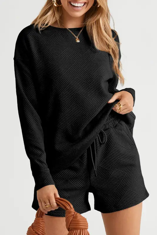 Black textured long sleeve top and drawstring shorts set