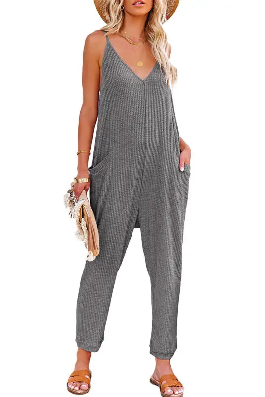 Black textured sleeveless v-neck pocketed casual jumpsuit - jumpsuits & rompers