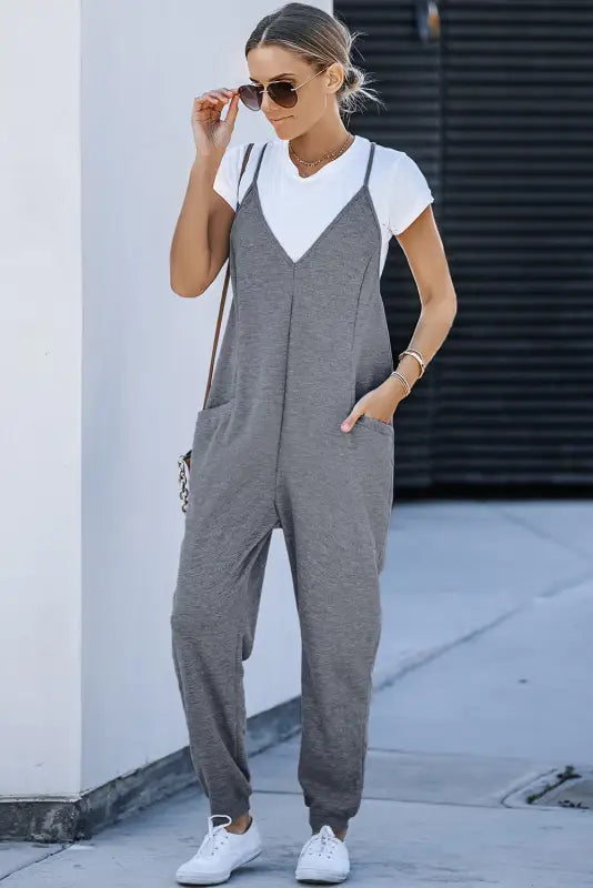 Black textured sleeveless v-neck pocketed casual jumpsuit - jumpsuits & rompers