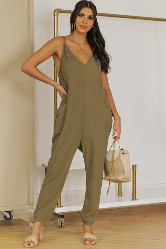 Black textured sleeveless v-neck pocketed casual jumpsuit - jumpsuits & rompers