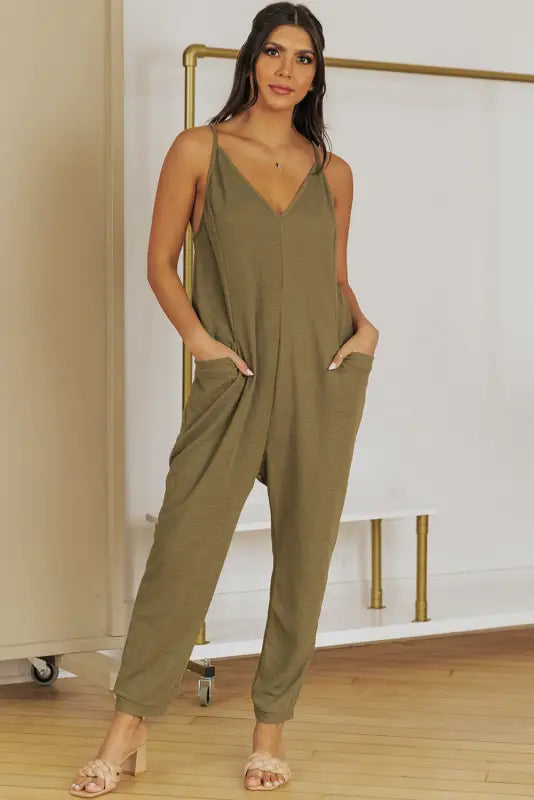 Black textured sleeveless v-neck pocketed casual jumpsuit - jumpsuits & rompers