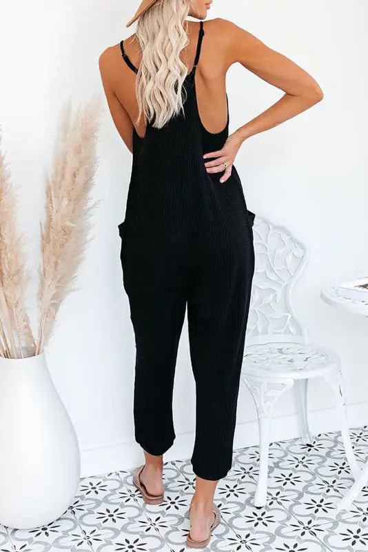 Black textured sleeveless v-neck pocketed casual jumpsuit - jumpsuits & rompers