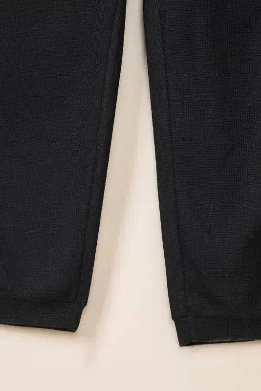 Black Textured Sleeveless V-Neck Pocketed Casual Jumpsuit - Fashionfitz