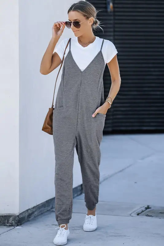 Black textured sleeveless v-neck pocketed casual jumpsuit - jumpsuits & rompers