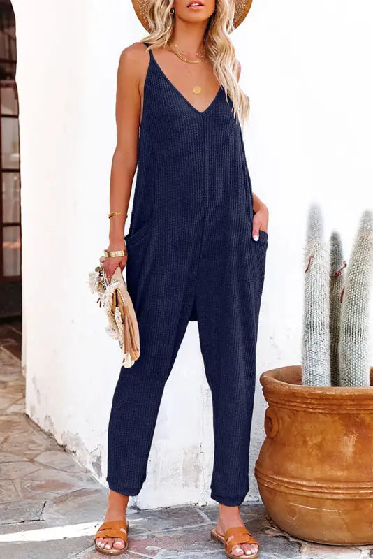 Black textured sleeveless v-neck pocketed casual jumpsuit - jumpsuits & rompers