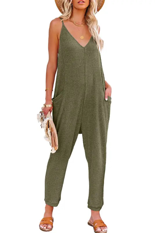 Black textured sleeveless v-neck pocketed casual jumpsuit - jumpsuits & rompers