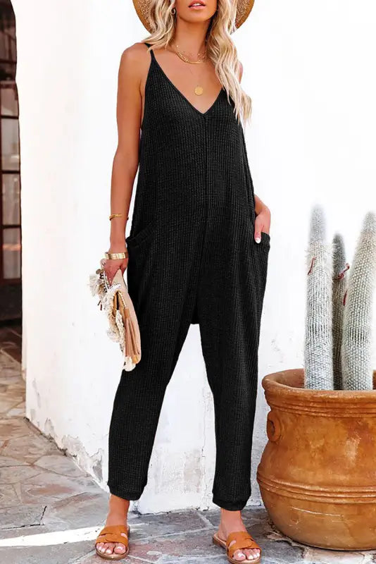 Black textured sleeveless v-neck pocketed casual jumpsuit - jumpsuits & rompers