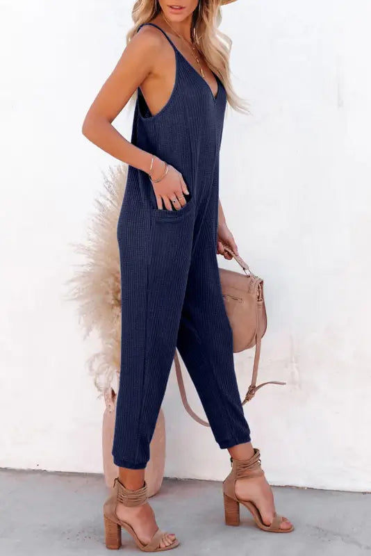 Black textured sleeveless v-neck pocketed casual jumpsuit - jumpsuits & rompers