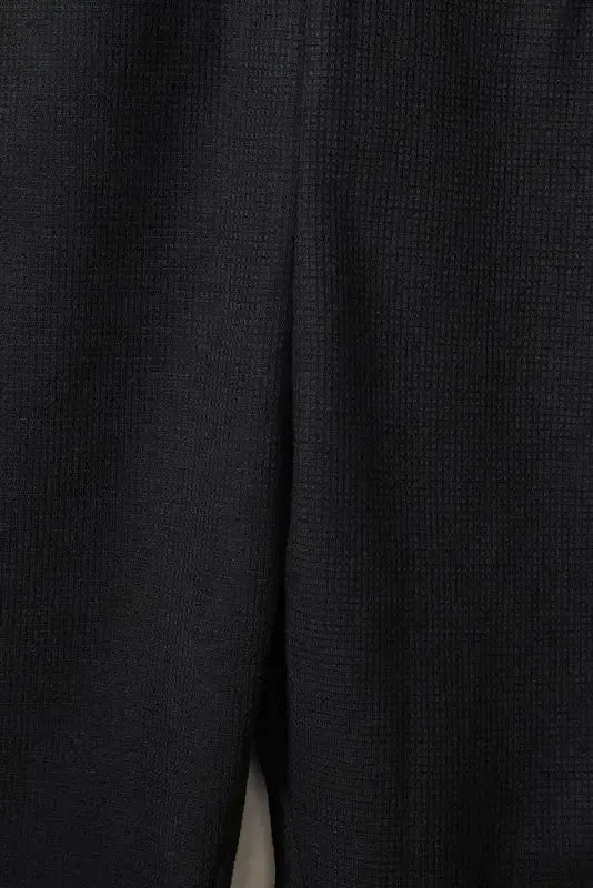 Black Textured Sleeveless V-Neck Pocketed Casual Jumpsuit - Fashionfitz