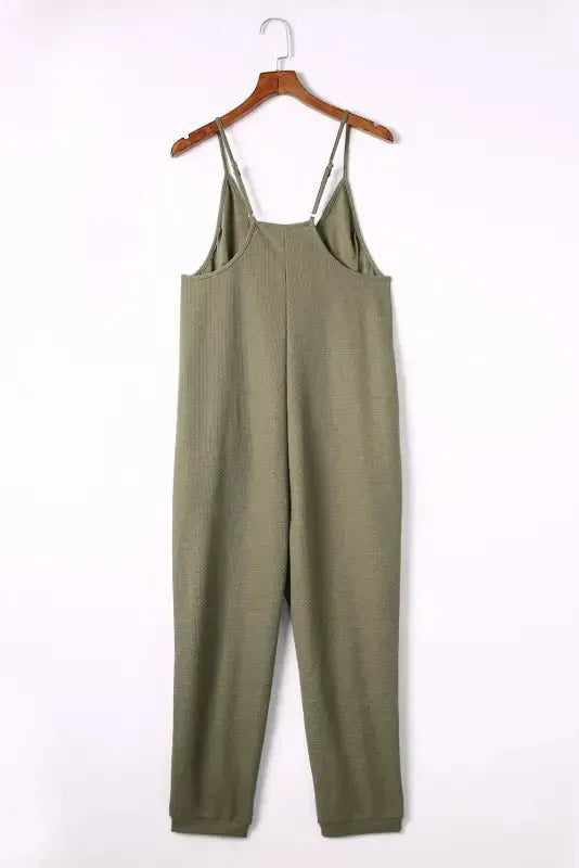 Black Textured Sleeveless V-Neck Pocketed Casual Jumpsuit - Fashionfitz