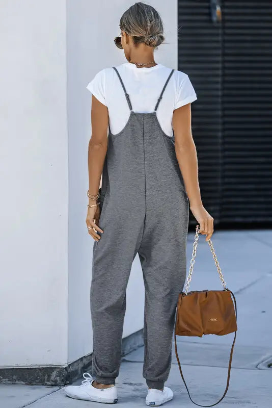 Black textured sleeveless v-neck pocketed casual jumpsuit - jumpsuits & rompers