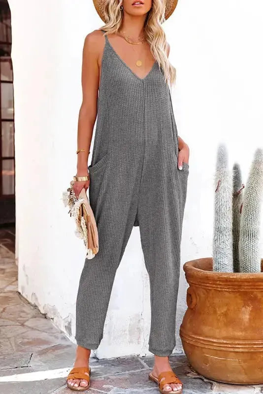 Black Textured Sleeveless V-Neck Pocketed Casual Jumpsuit - Fashionfitz