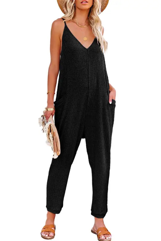 Black textured sleeveless v-neck pocketed casual jumpsuit - jumpsuits & rompers