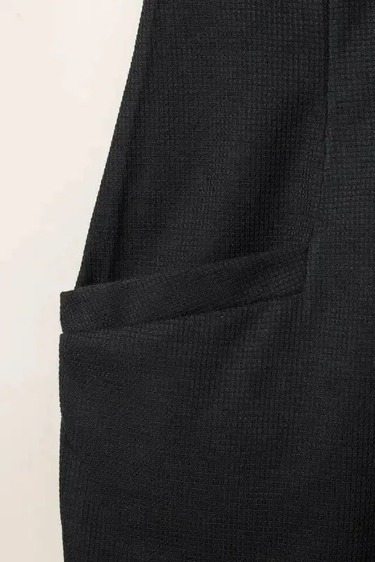 Black Textured Sleeveless V-Neck Pocketed Casual Jumpsuit - Fashionfitz