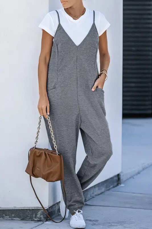 Black textured sleeveless v-neck pocketed casual jumpsuit - jumpsuits & rompers