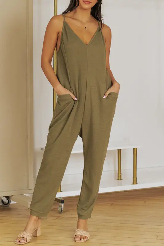 Black textured sleeveless v-neck pocketed casual jumpsuit - jumpsuits & rompers