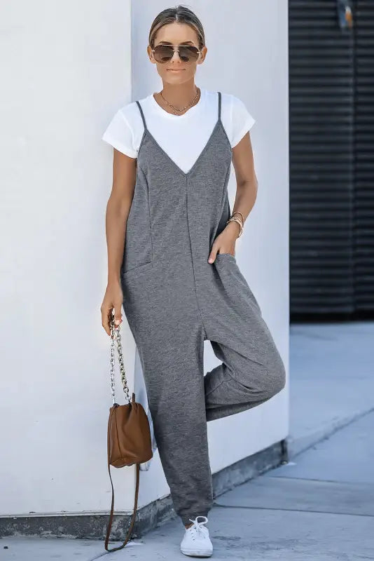 Black textured sleeveless v-neck pocketed casual jumpsuit - jumpsuits & rompers