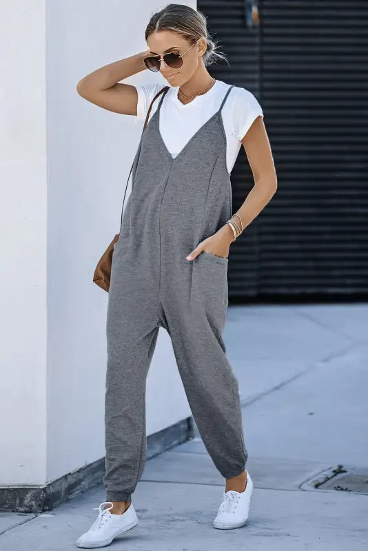 Black textured sleeveless v-neck pocketed casual jumpsuit - jumpsuits & rompers