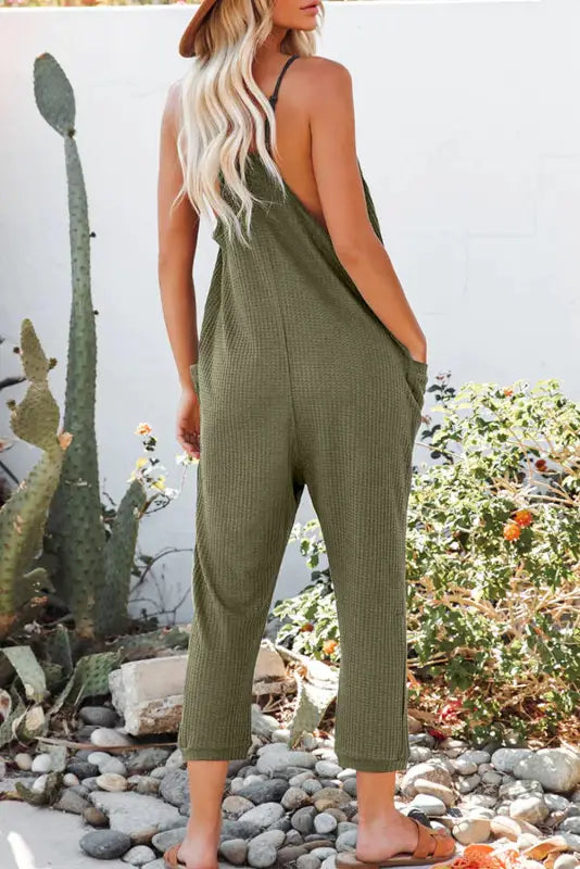 Black textured sleeveless v-neck pocketed casual jumpsuit - jumpsuits & rompers