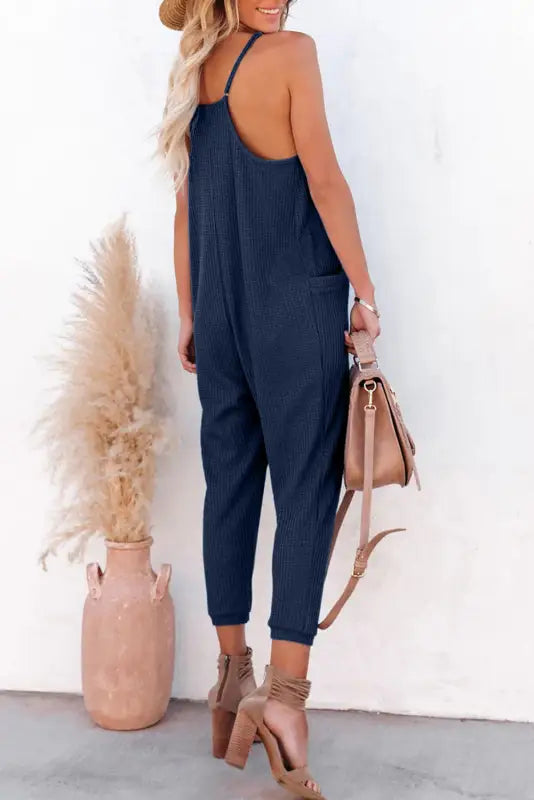 Black textured sleeveless v-neck pocketed casual jumpsuit - jumpsuits & rompers