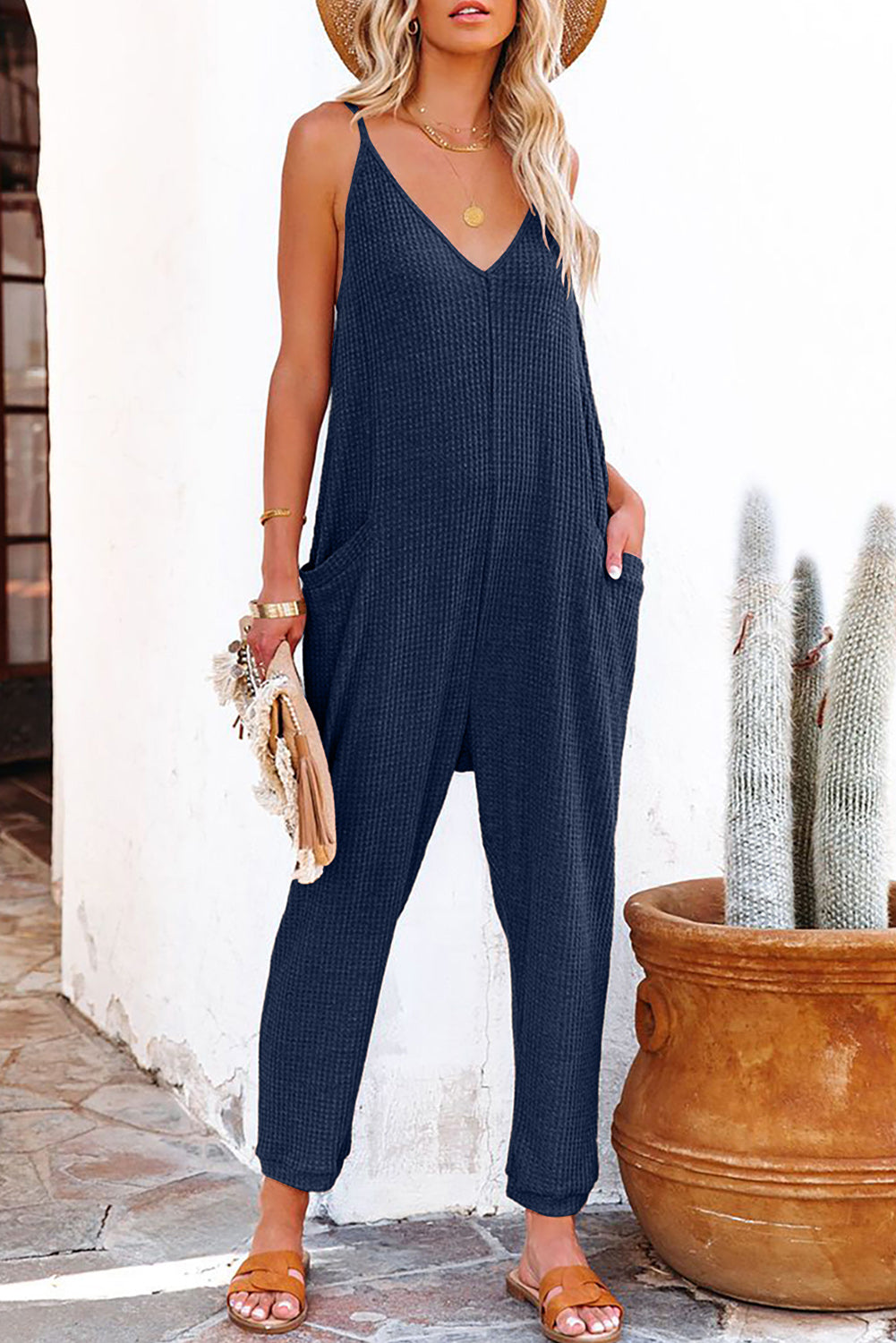 Black textured sleeveless v - neck pocketed casual jumpsuit - blue / s 95% polyester + 5% elastane jumpsuits & rompers