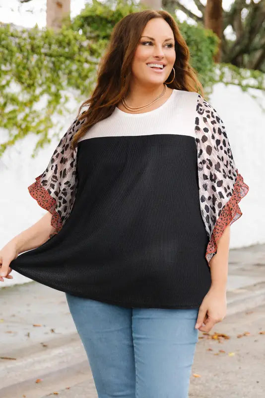 Black waffle knit animal print ruffle sleeves plus size top