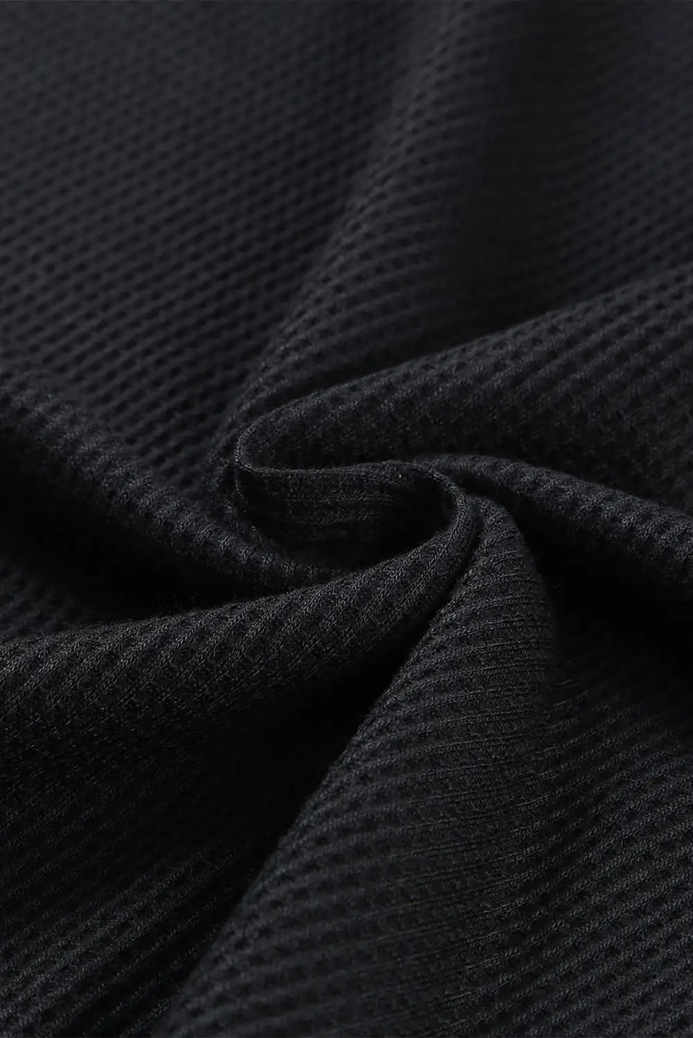 Black waffle knit animal print ruffle sleeves plus size top