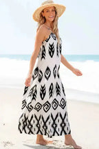 Model walking on the beach in a White Aztec Print Western Sundress, perfect for warm-weather layering and boho vacation looks.