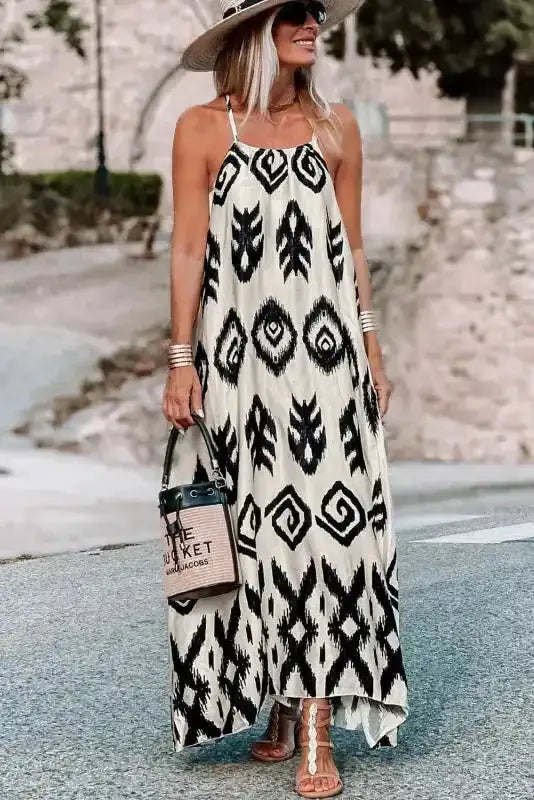 Bohemian-style White Aztec Print Western Sundress featuring bold black motifs, ideal for vacation or festival outfits.