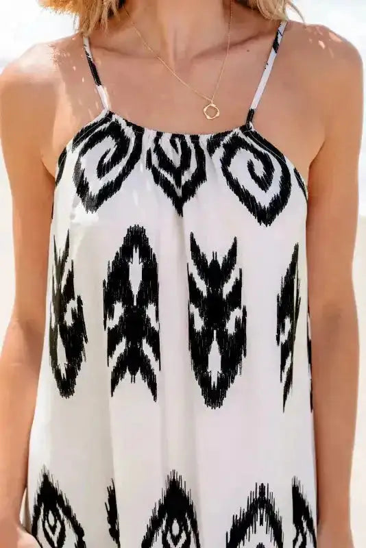Close-up of the White Aztec Print Western Sundress showing black tribal design and thin adjustable straps for a relaxed fit.