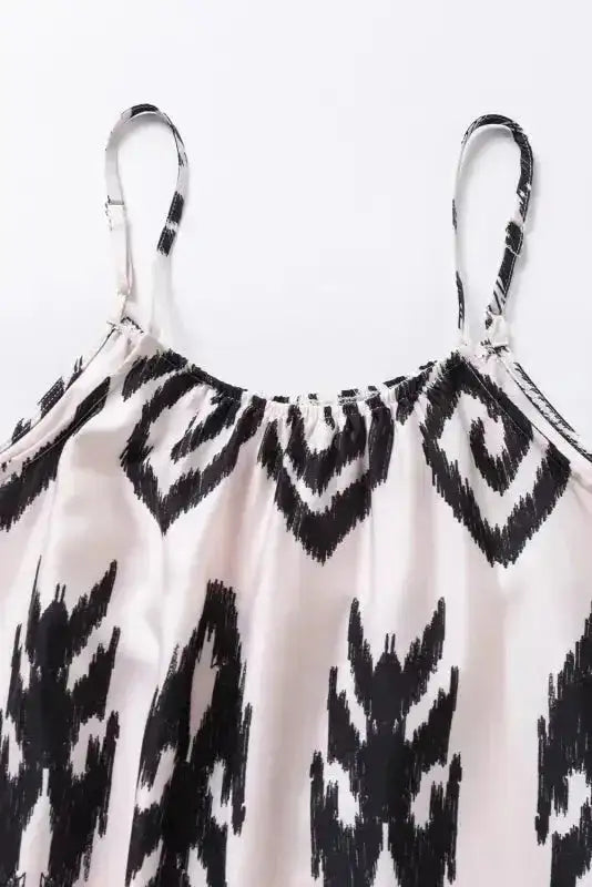 Detail view of the White Aztec Print Western Sundress neckline and straps, emphasizing the lightweight fabric and tribal print.