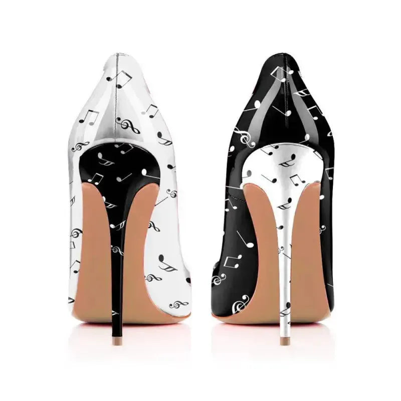 Black and white stiletto pumps front view showing pointed toe and contrast upper Fashionfitz UK