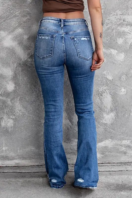 Blue distressed flare jeans