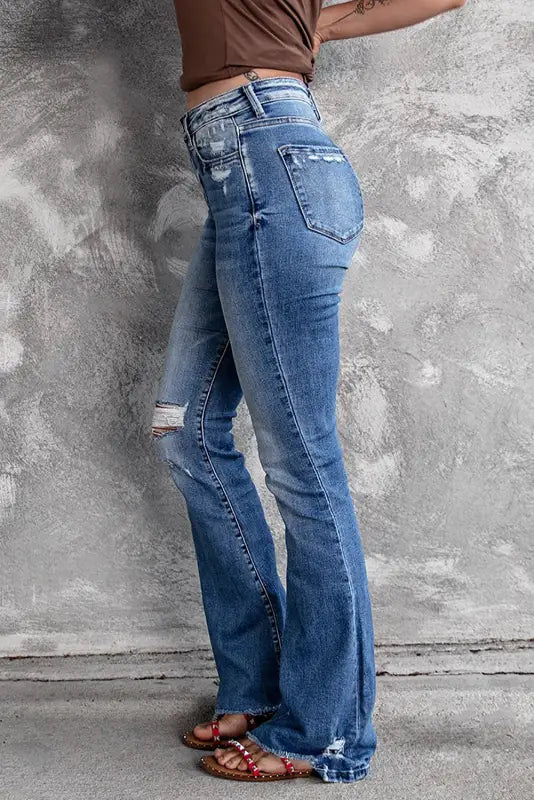 Blue distressed flare jeans