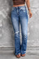 Blue distressed flare jeans